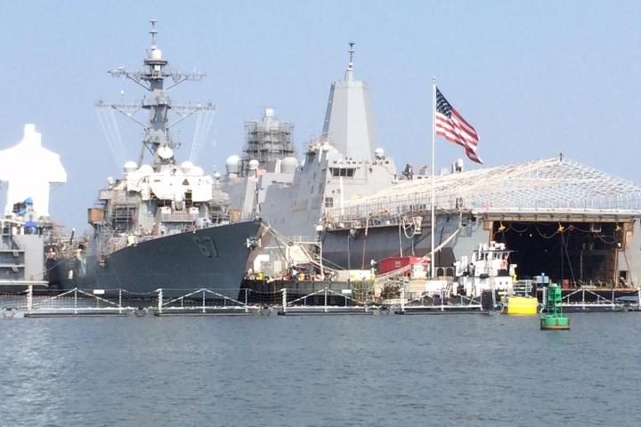 USS Cole (DDG-67) with american flag