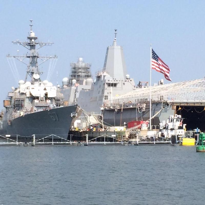 USS Cole (DDG-67) with american flag